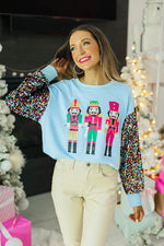 Nutcrackers On Blue Top with Sequin Sleeves